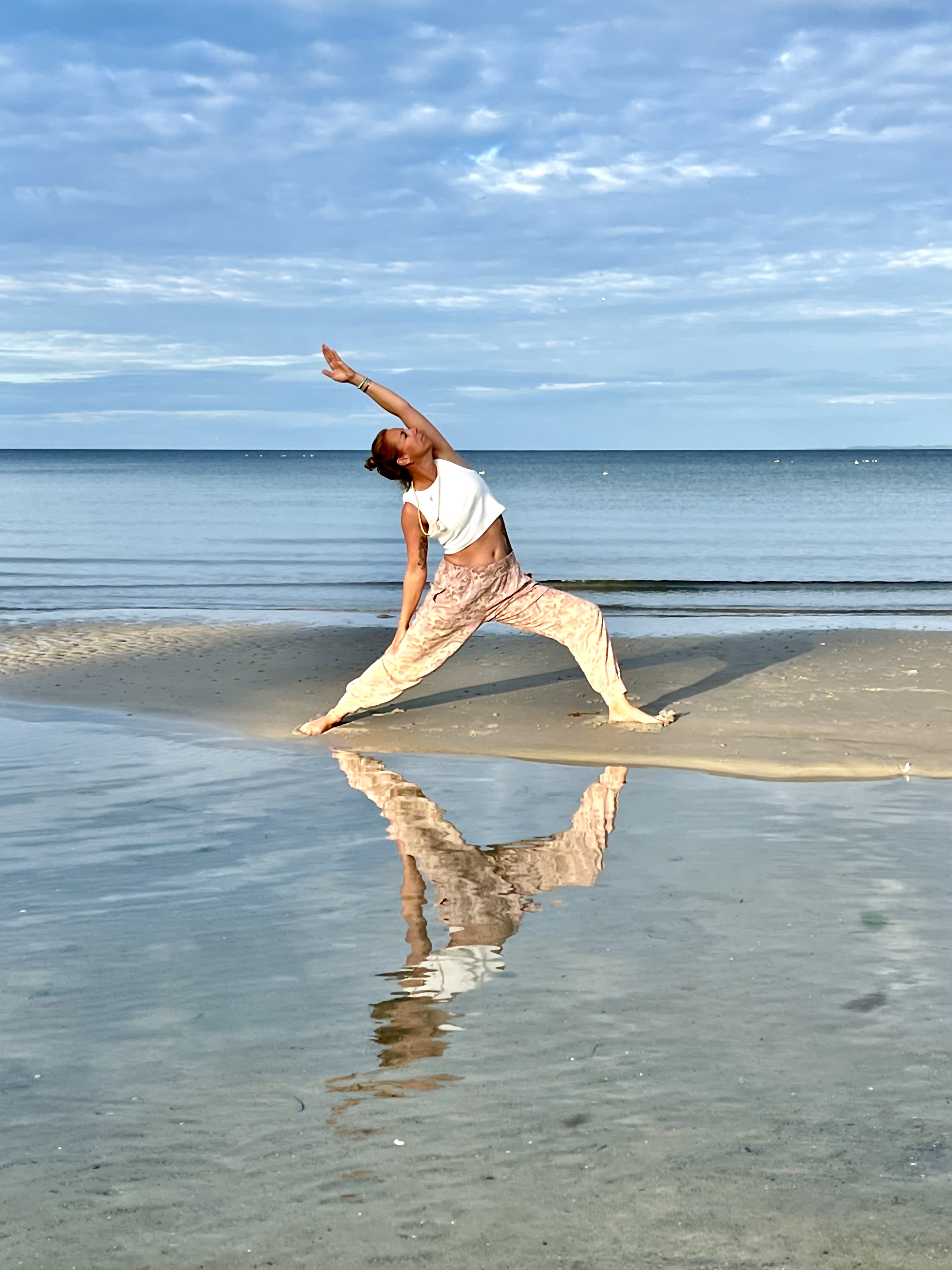 Strandyoga an der Ostsee Scharbeutz